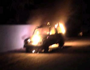 Police vehicle on fire in what was once the United Suvadive Islands Republic